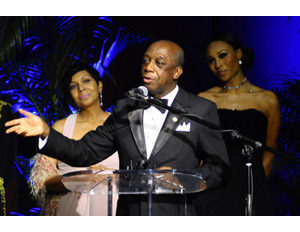 Dr. Thomas Mensah, accepts Excellence in Science and Technology Award at the Not Alone Foundation Second Biennial Diamond Awards at Morehouse College Ray Charles Performing Arts Center.